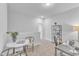 Bright office space with a small table and chairs at 8947 Kennebec Crossing Dr # 53, Angier, NC 27501