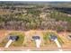 Aerial view of new construction homes featuring spacious lots and proximity to wooded areas at 9342 Turkey Way, Middlesex, NC 27557