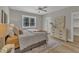 Cozy bedroom with a ceiling fan, a large window, and stylish decor at 9342 Turkey Way, Middlesex, NC 27557