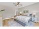 Spacious bedroom featuring neutral walls, a ceiling fan, and well-coordinated furnishings at 9342 Turkey Way, Middlesex, NC 27557