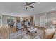 Open-concept living area featuring hardwood floors and a seamless flow to the kitchen and dining space at 9342 Turkey Way, Middlesex, NC 27557