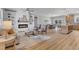Spacious living room featuring a fireplace, built-in shelving, and an open floor plan at 9342 Turkey Way, Middlesex, NC 27557