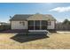 House exterior showcasing a screened porch and deck, perfect for relaxation at 110 Mocha Ln, Clayton, NC 27520