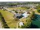 Aerial view of the community with pool and clubhouse amidst homes and green spaces at 116 Bearwallow Forest Way, Wendell, NC 27591