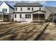 View of the home's backyard and screened in porch at 116 Bearwallow Forest Way, Wendell, NC 27591