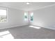 Bright bedroom featuring neutral walls and carpet at 116 Bearwallow Forest Way, Wendell, NC 27591