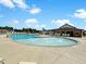 Community pool area with plenty of space to lounge and enjoy the sun, perfect for neighborhood gatherings at 116 Bearwallow Forest Way, Wendell, NC 27591