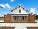 Charming exterior displaying a stone foundation, horizontal wood detail, and stylish window shutters at 116 Bearwallow Forest Way, Wendell, NC 27591