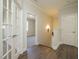 Hallway with a view into another room and access to multiple doors at 116 Bearwallow Forest Way, Wendell, NC 27591