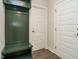 This mudroom features a built-in hall tree with storage and an adjacent door at 116 Bearwallow Forest Way, Wendell, NC 27591