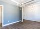 Bright dining room with wood floors and decorative chandelier at 121 Big Bradley Way, Wendell, NC 27591