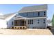 Exterior view of a house with screened-in porch at 121 Big Bradley Way, Wendell, NC 27591