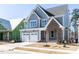 Beautiful two-story home featuring a two-car garage and well-maintained landscaping at 121 Big Bradley Way, Wendell, NC 27591