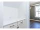 A nook with cabinets, countertop, and outlets at 121 Big Bradley Way, Wendell, NC 27591