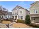 Charming two-story home featuring a welcoming front porch and well-maintained landscaping at 126 Owen Towne Rd, Chapel Hill, NC 27516