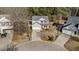 Aerial view of a two-story home with mature trees and manicured lawn at 1305 Turks Head Ct, Zebulon, NC 27597
