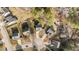 Aerial view of a two-story home with mature trees and manicured lawn at 1305 Turks Head Ct, Zebulon, NC 27597