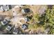 Birds eye view of neighborhood and a charming two-story home with grey siding, red shutters at 1305 Turks Head Ct, Zebulon, NC 27597