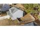 This aerial view shows the home's fenced-in backyard with a screen porch at 1305 Turks Head Ct, Zebulon, NC 27597