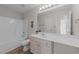 Bright bathroom featuring a tub-shower, stylish vanity with mirror, and neutral decor at 1305 Turks Head Ct, Zebulon, NC 27597