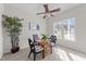 This is a sunny breakfast nook with neutral walls and a charming wicker table set at 1305 Turks Head Ct, Zebulon, NC 27597