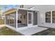 This is a close up of the home's screened porch with white trim and a concrete floor at 1305 Turks Head Ct, Zebulon, NC 27597