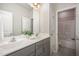 Shared bathroom with double vanity and tub/shower combo at 131 Kinnakeet Dr, Durham, NC 27704