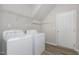 Convenient laundry room with washer, dryer, and shelving at 131 Kinnakeet Dr, Durham, NC 27704