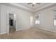 Spacious main bedroom with walk-in closet and ceiling fan at 131 Kinnakeet Dr, Durham, NC 27704