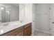 Bathroom with a double vanity, spacious countertop, and wood cabinets at 139 Grove Township Way, Angier, NC 27501