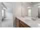 Bright bathroom featuring a double vanity, spacious countertop and wood cabinets at 139 Grove Township Way, Angier, NC 27501