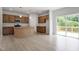A kitchen featuring granite countertops, stainless steel appliances, and wooden cabinetry at 139 Grove Township Way, Angier, NC 27501