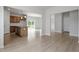 Bright and airy kitchen with an island, stainless steel appliances, and seamless flow to the living area at 139 Grove Township Way, Angier, NC 27501