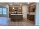 Stylish kitchen boasts a center island, stainless steel appliances, and ample cabinet space at 139 Grove Township Way, Angier, NC 27501