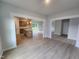 Spacious living area showing kitchen with center island and seamless flow to outdoor deck at 139 Grove Township Way, Angier, NC 27501