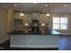 Modern kitchen with island and stainless steel appliances at 1410 Reading Ct # 92Kl, Burlington, NC 27217