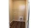 Laundry room with built-in shelving and vinyl flooring at 1410 Reading Ct # 92Kl, Burlington, NC 27217