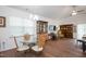 Bright dining area with glass-top table and wicker chairs at 145 S Great White Way, Clayton, NC 27527