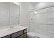 Clean bathroom with a glass-enclosed shower, modern vanity and fixtures at 157 Grove Township Way, Angier, NC 27501