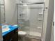Bathroom with a glass-enclosed shower and a vanity at 157 Grove Township Way, Angier, NC 27501