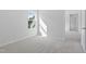 Clean, bright bedroom with a window and neutral carpet, ready for personalization at 157 Grove Township Way, Angier, NC 27501