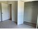 Bedroom showcasing a closet with double doors and open access at 157 Grove Township Way, Angier, NC 27501