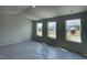 Light-filled living room with large windows offering picturesque views at 157 Grove Township Way, Angier, NC 27501
