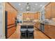 Updated kitchen featuring modern appliances, island seating, and plenty of storage at 1703 Happiness Hill Ln, Raleigh, NC 27614
