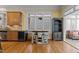 Bright eat-in kitchen with wine cooler and butler's pantry at 1703 Happiness Hill Ln, Raleigh, NC 27614