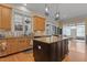 Well-equipped kitchen with large island, granite countertops, and ample cabinet space at 1703 Happiness Hill Ln, Raleigh, NC 27614