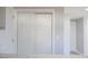 White sliding door pantry with ample storage space at 1723 Oklahoma Ave, Burlington, NC 27217