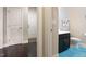 Bathroom boasts a modern vanity with a dark cabinet and a bright blue rug at 1726 Rapids Ct, Franklinton, NC 27525