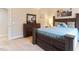 Bedroom showcases beautiful wood furniture and a large window at 1726 Rapids Ct, Franklinton, NC 27525