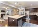 Modern kitchen with granite countertops, stainless steel appliances, and an island at 1726 Rapids Ct, Franklinton, NC 27525